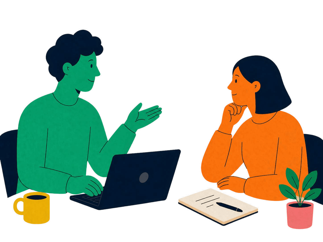 Two people in a friendly consultation across a laptop