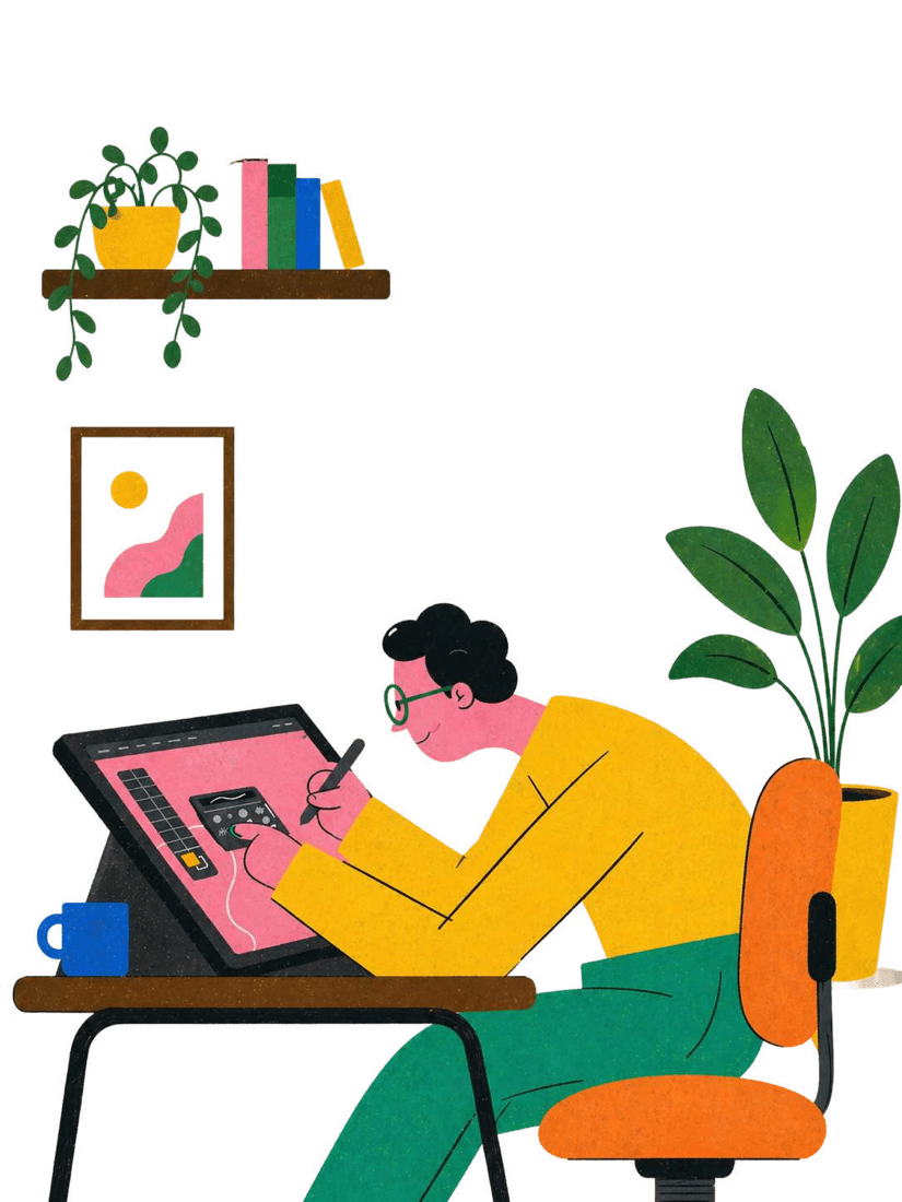 A person drawing happily on a tablet at their desk